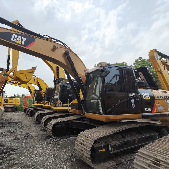 Used Digger CAT 329D2 Construction Machinery Construction Digger Used CAT 329D2 Cheap Excavator - Багер гасеничар: слика 1 Used Digger CAT 329D2 Construction Machinery Construction Digger Used CAT 329D2 Cheap Excavator - Багер гасеничар: слика 1