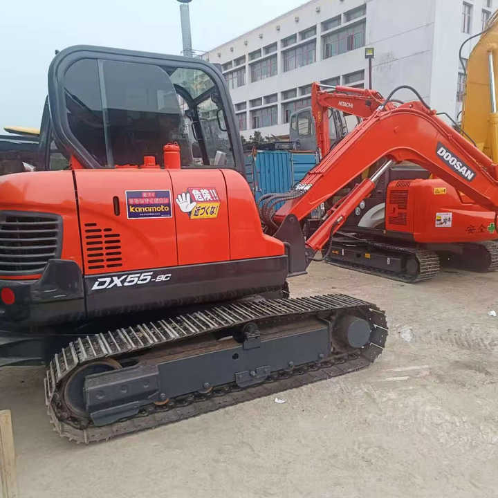 Used Digger DOOSAN DX55 Construction Machinery Construction Digger Used DOOSAN DX55 Cheap Excavator - Багер гасеничар: слика 1 Used Digger DOOSAN DX55 Construction Machinery Construction Digger Used DOOSAN DX55 Cheap Excavator - Багер гасеничар: слика 1