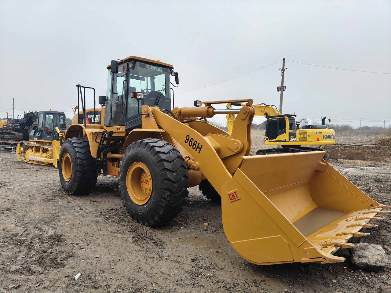 CATERPILLAR 966H - Натоварувач на тркала: слика 1 CATERPILLAR 966H - Натоварувач на тркала: слика 1