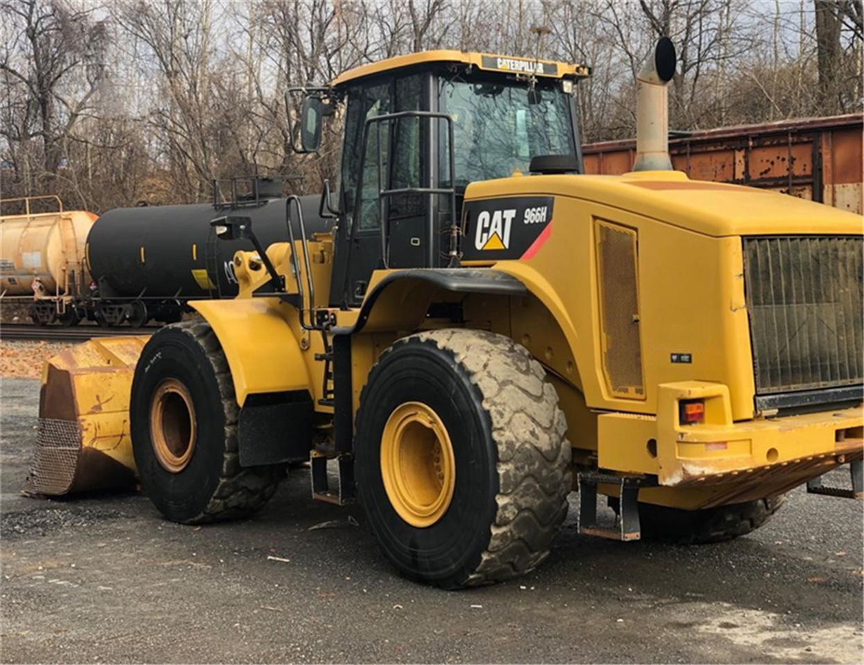 CATERPILLAR 966H - Компактен натоварувач: слика 1 CATERPILLAR 966H - Компактен натоварувач: слика 1