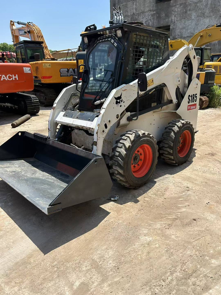 BOBCAT Skid Steer Loader S185 - Градежна машина: слика 1 BOBCAT Skid Steer Loader S185 - Градежна машина: слика 1