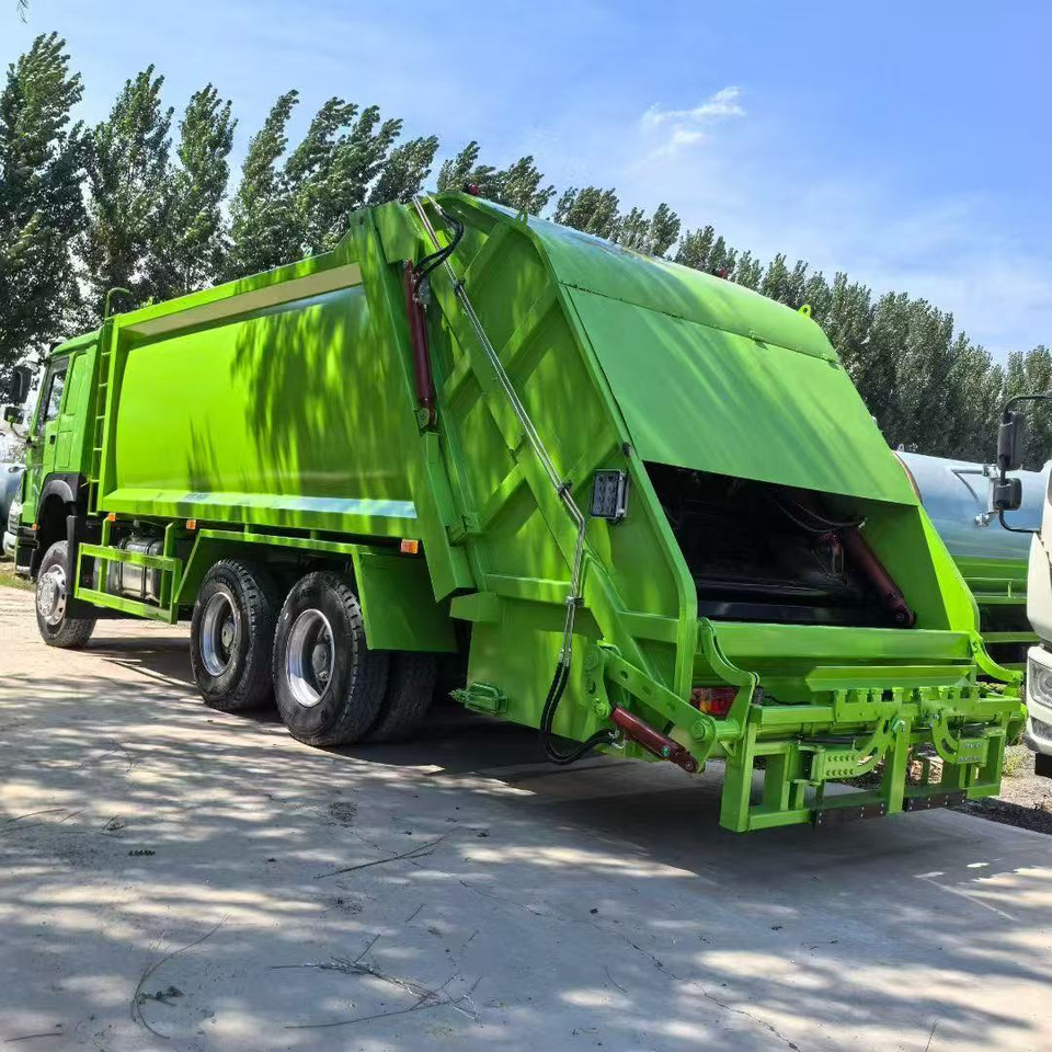 HOWO Garbage Truck Click Here for Discount - Камион за ѓубре: слика 4 HOWO Garbage Truck Click Here for Discount - Камион за ѓубре: слика 4
