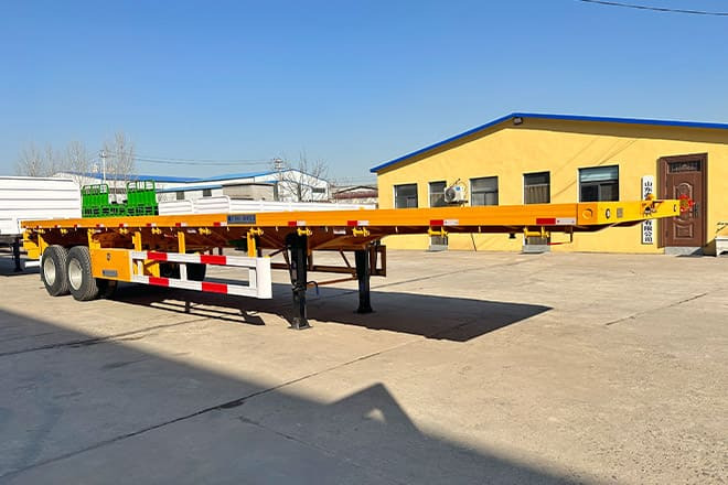 TITAN 2 Axle 40 Ft Flatbed Trailer for Sale in Uganda - Полуприколка платформа: слика 2 TITAN 2 Axle 40 Ft Flatbed Trailer for Sale in Uganda - Полуприколка платформа: слика 2