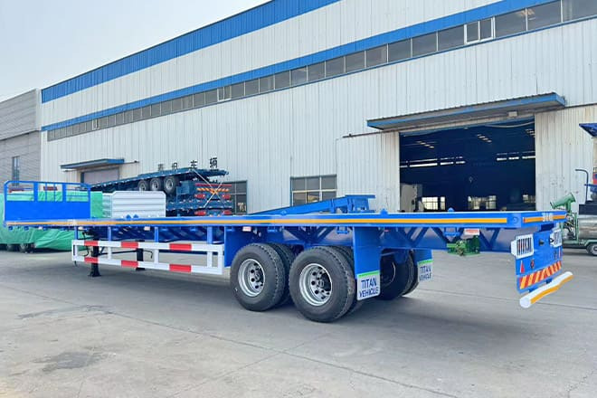 TITAN 2 Axle 45 Ft Flatbed Trailers for Sale in Algeria - Полуприколка платформа: слика 1 TITAN 2 Axle 45 Ft Flatbed Trailers for Sale in Algeria - Полуприколка платформа: слика 1
