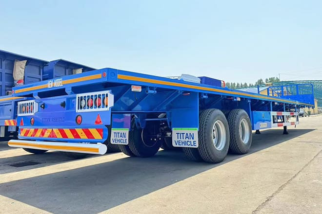 TITAN 2 Axle 45 Ft Flatbed Trailers for Sale in Algeria - Полуприколка платформа: слика 4 TITAN 2 Axle 45 Ft Flatbed Trailers for Sale in Algeria - Полуприколка платформа: слика 4