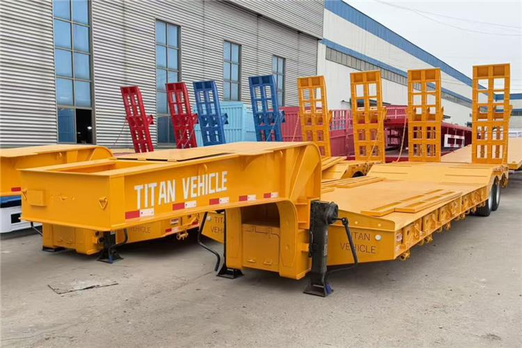 TITAN 2 Axle 50 Ton Low Bed Trailer for Sale In Nigeria Lagos - Полуприколка за низок утовар: слика 1 TITAN 2 Axle 50 Ton Low Bed Trailer for Sale In Nigeria Lagos - Полуприколка за низок утовар: слика 1