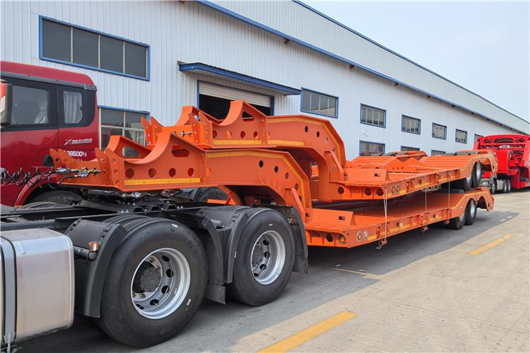 TITAN 2 Axle Low Low Bed Trailer for Sale In Angola - Полуприколка за низок утовар: слика 1 TITAN 2 Axle Low Low Bed Trailer for Sale In Angola - Полуприколка за низок утовар: слика 1