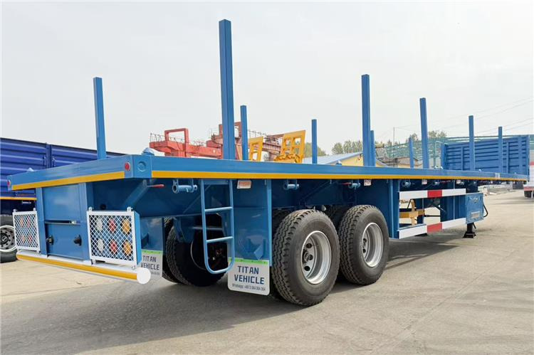 TITAN 2 Axle Wood Log Trailer Flatbed Trailer for Sale In Zimbabwe - Полуприколка за дрва: слика 1 TITAN 2 Axle Wood Log Trailer Flatbed Trailer for Sale In Zimbabwe - Полуприколка за дрва: слика 1