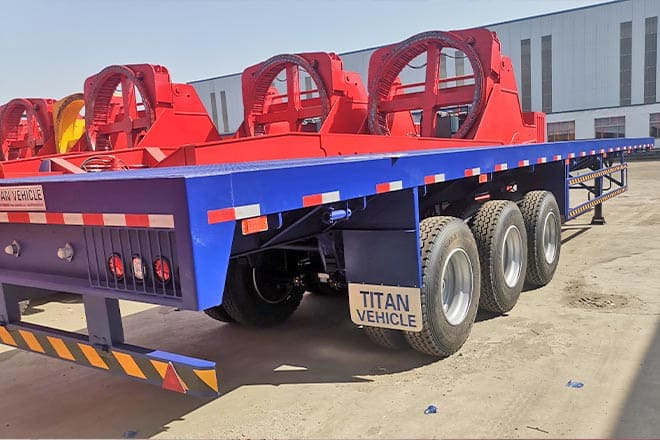 TITAN 3 Axle Extendable Flatbed Trailers for Sale in Angola - Полуприколка платформа: слика 5 TITAN 3 Axle Extendable Flatbed Trailers for Sale in Angola - Полуприколка платформа: слика 5