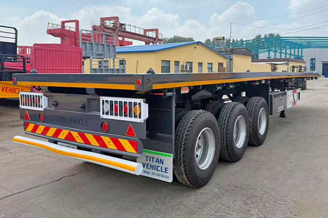 TITAN 3 Axle Flatbed Semi Trailer for Sale in Ghana - Полуприколка платформа: слика 2 TITAN 3 Axle Flatbed Semi Trailer for Sale in Ghana - Полуприколка платформа: слика 2
