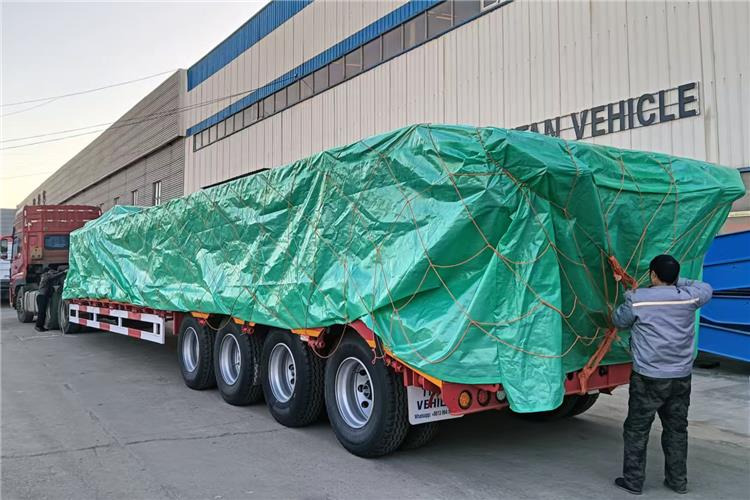 TITAN 4 Axle 100 Ton Low Bed Truck Trailer for Sale In Zambia - Полуприколка за низок утовар: слика 4 TITAN 4 Axle 100 Ton Low Bed Truck Trailer for Sale In Zambia - Полуприколка за низок утовар: слика 4