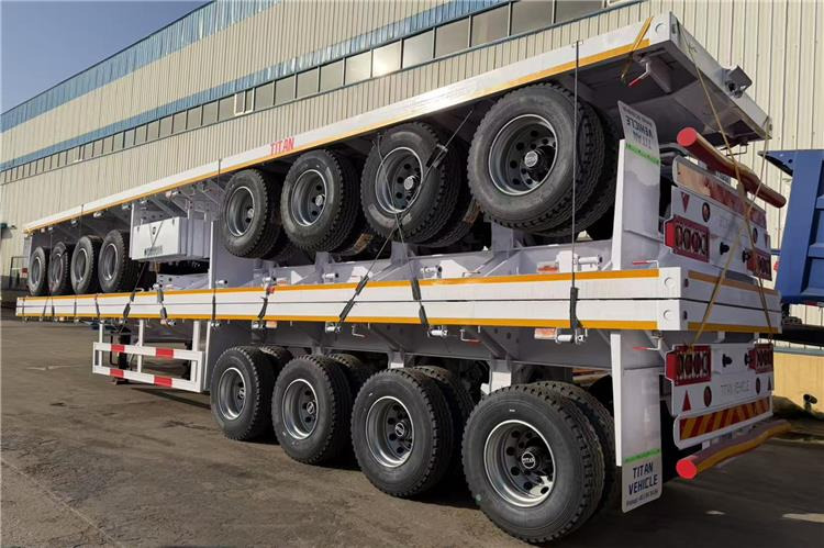 TITAN 4 Axle Flatbed Trailer for Sale In Saudi Arabia - Полуприколка платформа: слика 2 TITAN 4 Axle Flatbed Trailer for Sale In Saudi Arabia - Полуприколка платформа: слика 2