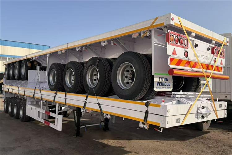 TITAN 4 Axle Flatbed Trailer for Sale In Saudi Arabia - Полуприколка платформа: слика 5 TITAN 4 Axle Flatbed Trailer for Sale In Saudi Arabia - Полуприколка платформа: слика 5