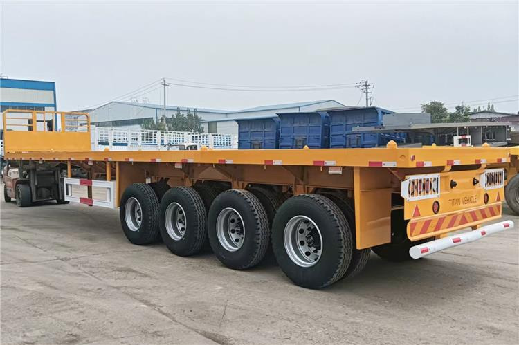 TITAN 4 Axle Flatbed Trailer for Sale Price In Senegal - Полуприколка платформа: слика 2 TITAN 4 Axle Flatbed Trailer for Sale Price In Senegal - Полуприколка платформа: слика 2
