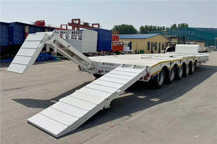 TITAN 5 Axle 100 Ton Low Bed Trailer for Sale In Tanzania - Полуприколка за низок утовар: слика 2 TITAN 5 Axle 100 Ton Low Bed Trailer for Sale In Tanzania - Полуприколка за низок утовар: слика 2