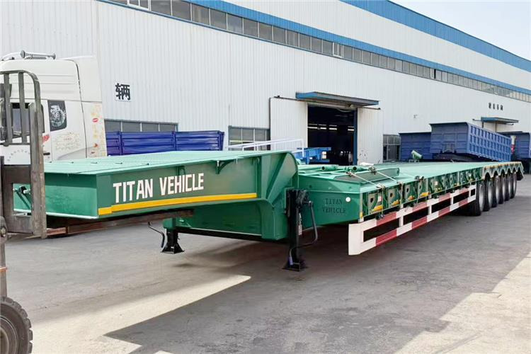 TITAN 6 Axle 80 Ton Low Loader Semi Trailer for Sale In Zambia - Полуприколка за низок утовар: слика 1 TITAN 6 Axle 80 Ton Low Loader Semi Trailer for Sale In Zambia - Полуприколка за низок утовар: слика 1