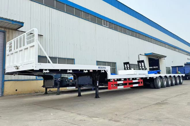 TITAN 6 Axle Step Deck Flatbed Trailer for Sale in Philippines - Полуприколка платформа: слика 1 TITAN 6 Axle Step Deck Flatbed Trailer for Sale in Philippines - Полуприколка платформа: слика 1