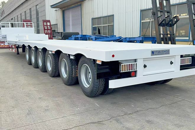 TITAN 6 Axle Step Deck Flatbed Trailer for Sale in Philippines - Полуприколка платформа: слика 2 TITAN 6 Axle Step Deck Flatbed Trailer for Sale in Philippines - Полуприколка платформа: слика 2