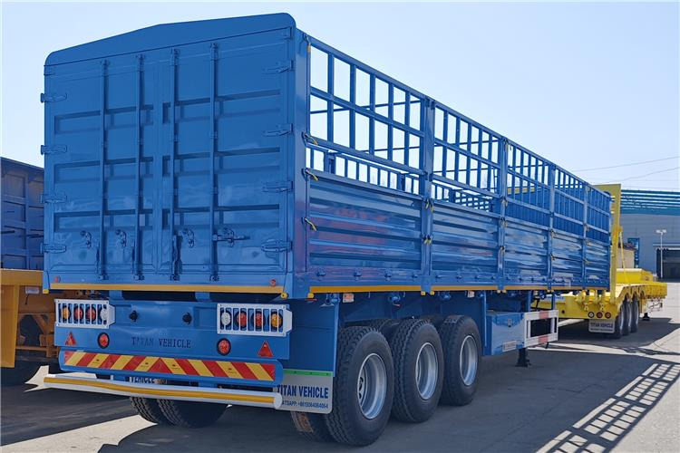 TITAN 60 Ton Fence Cargo Semi Trailer for Sale in Tanzania - Полуприколка за добиток: слика 1 TITAN 60 Ton Fence Cargo Semi Trailer for Sale in Tanzania - Полуприколка за добиток: слика 1