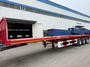 TITAN Flatbed Tri Axle Truck Trailer for Sale in Tanzania - Полуприколка платформа: слика 1 TITAN Flatbed Tri Axle Truck Trailer for Sale in Tanzania - Полуприколка платформа: слика 1