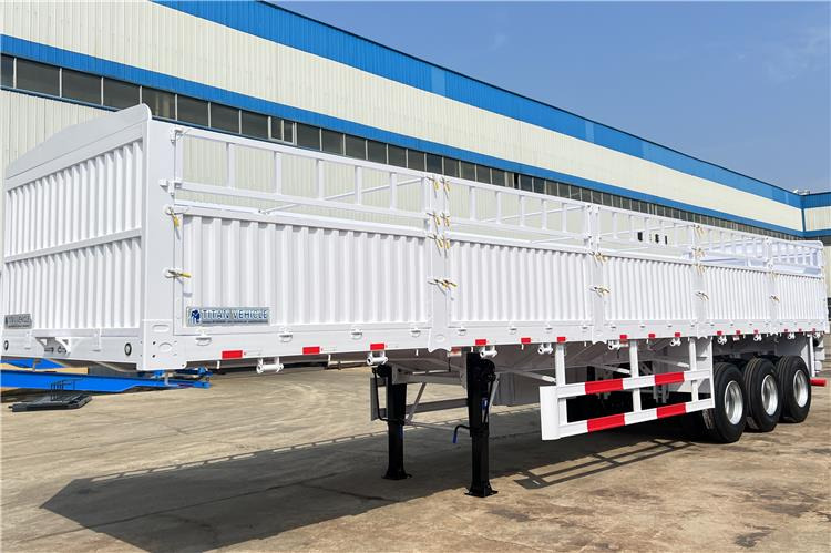 TITAN Tri Axle 60 Ton Fence Cargo Semi Trailer for Sale In Guinea - Полуприколка за добиток: слика 1 TITAN Tri Axle 60 Ton Fence Cargo Semi Trailer for Sale In Guinea - Полуприколка за добиток: слика 1