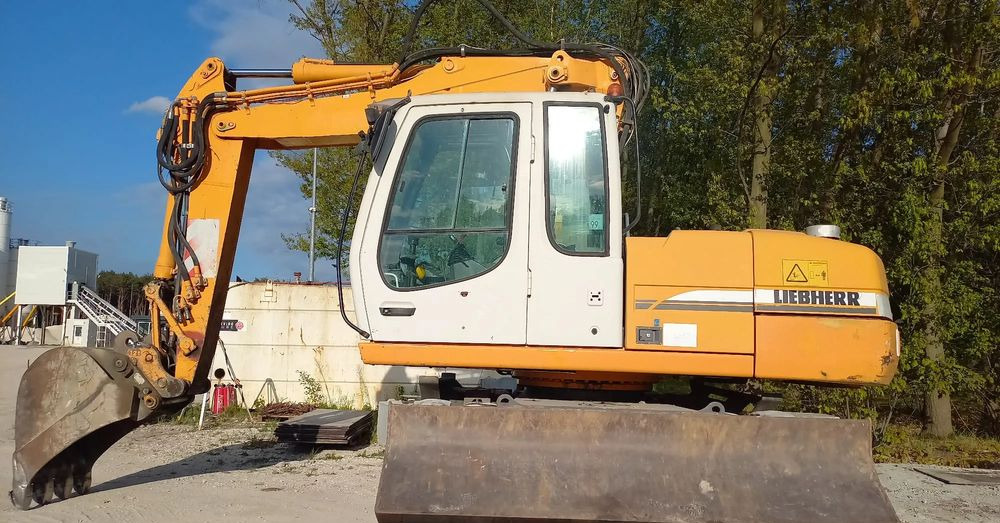 Liebherr A316 - Багер на тркала: слика 1 Liebherr A316 - Багер на тркала: слика 1