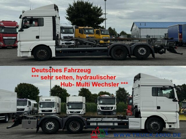 MAN TGX 26.480 XLX Haus Bett hydr Hub Multi Wechsler - Транспортер на контејнер/ Камион со променливо тело: слика 1 MAN TGX 26.480 XLX Haus Bett hydr Hub Multi Wechsler - Транспортер на контејнер/ Камион со променливо тело: слика 1