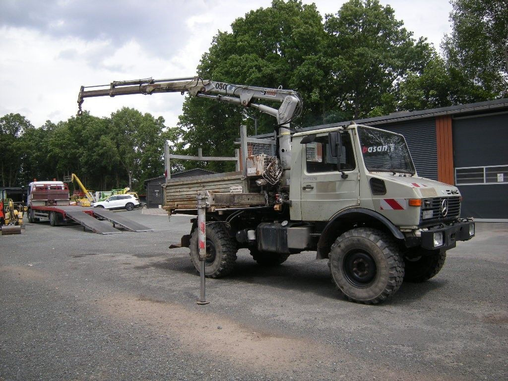 Unimog U1250 mit Kran - Комби кипер: слика 1 Unimog U1250 mit Kran - Комби кипер: слика 1
