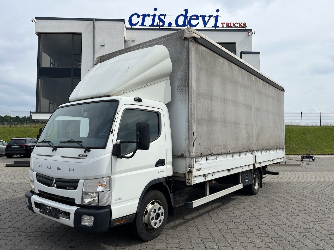 FUSO Canter 7C18 4x2 Ladebordwand Getriebeschaden - Комбе со церада: слика 1 FUSO Canter 7C18 4x2 Ladebordwand Getriebeschaden - Комбе со церада: слика 1