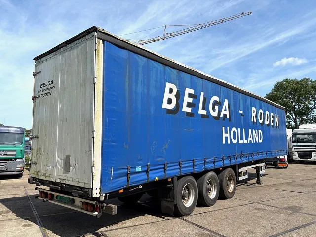 Schmitz Cargobull S01 3-AXLE CURTAINS SIDE WITH SLIDING ROOF (SAF AXLES / DRUM BRAKES / ABS BRAKE SYSTEM) - Полуприколка со церада: слика 3 Schmitz Cargobull S01 3-AXLE CURTAINS SIDE WITH SLIDING ROOF (SAF AXLES / DRUM BRAKES / ABS BRAKE SYSTEM) - Полуприколка со церада: слика 3