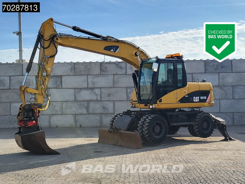 Caterpillar M313 D OUTRIGGERS + BLADE - Багер на тркала: слика 1 Caterpillar M313 D OUTRIGGERS + BLADE - Багер на тркала: слика 1