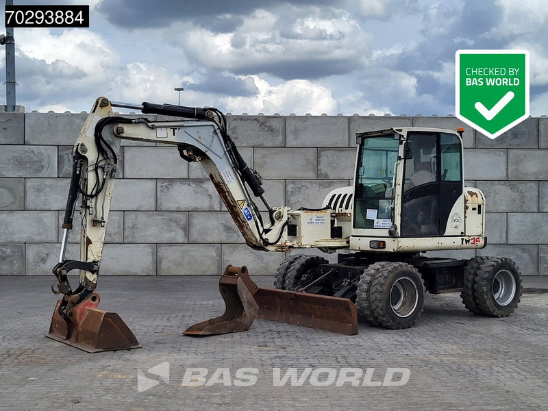 Terex TW85 - Багер на тркала: слика 1 Terex TW85 - Багер на тркала: слика 1