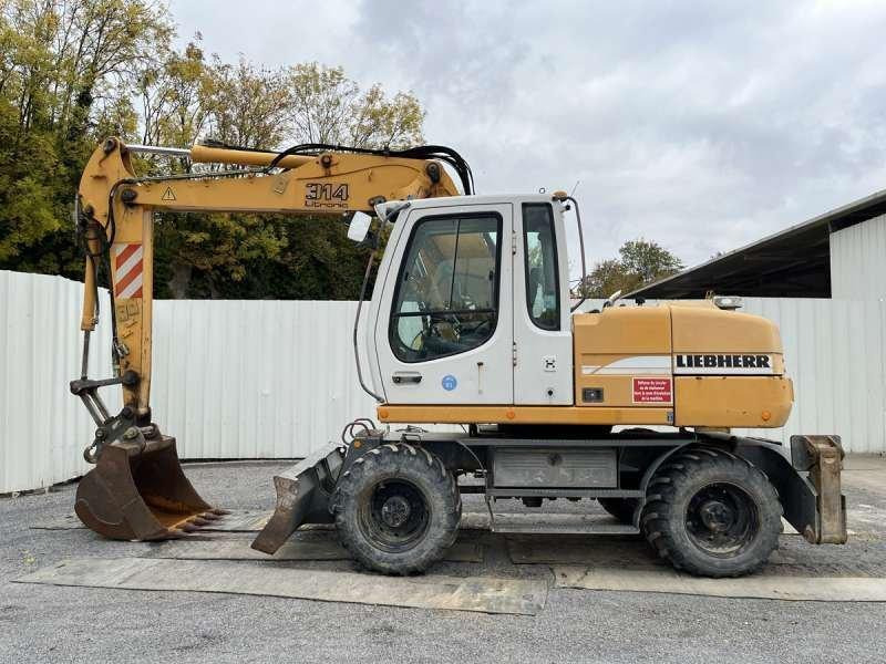 Liebherr A314 Litronic - Багер на тркала: слика 3 Liebherr A314 Litronic - Багер на тркала: слика 3