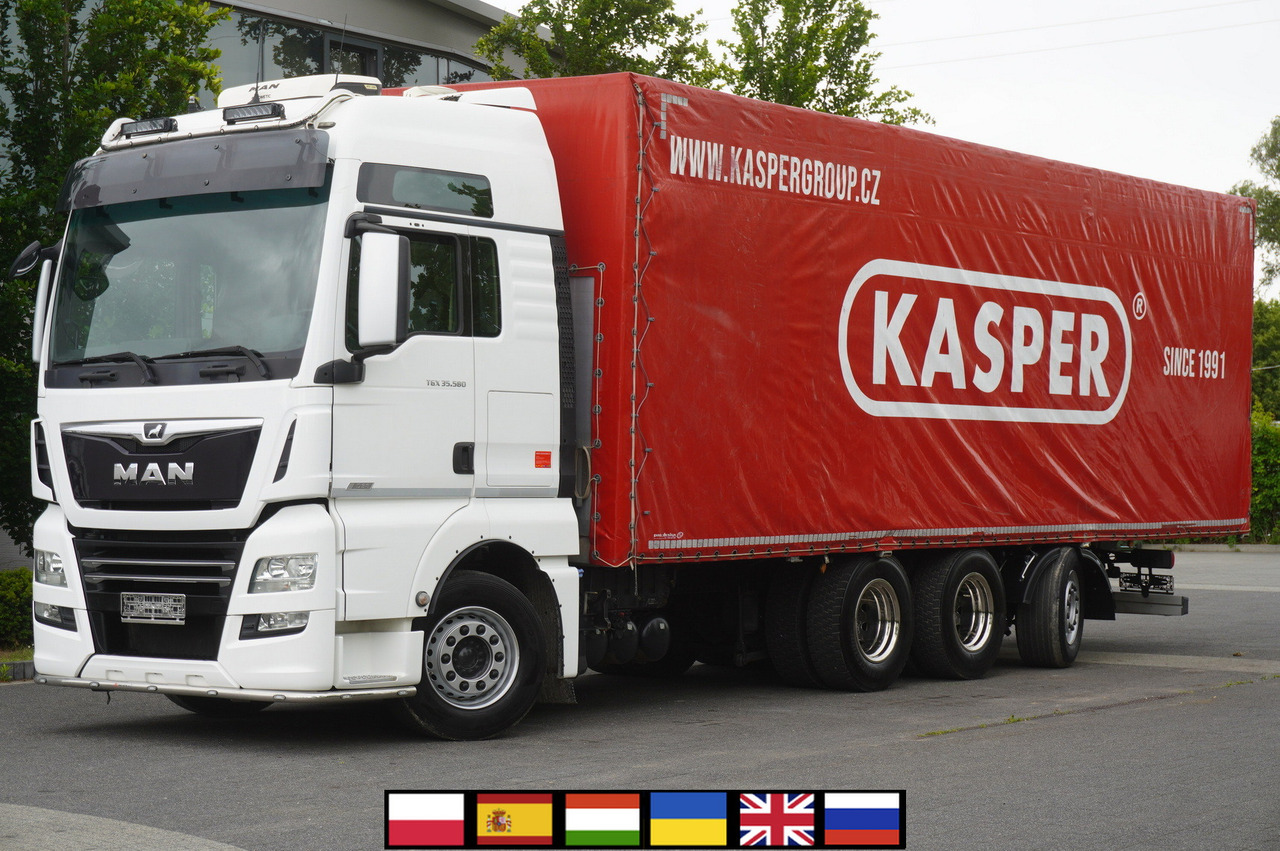 MAN MAN TGX 35.580 E6 8x4 /4 / 23 EPAL tarp superstructure / 4th axle steered - Камион со церада: слика 1 MAN MAN TGX 35.580 E6 8x4 /4 / 23 EPAL tarp superstructure / 4th axle steered - Камион со церада: слика 1
