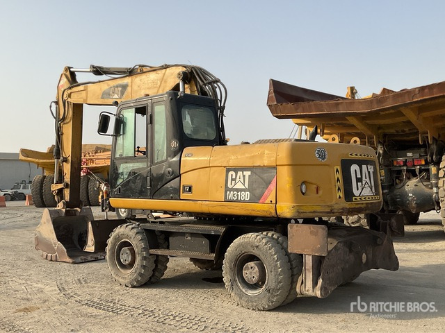 2012 Cat M318D - Багер на тркала: слика 4 2012 Cat M318D - Багер на тркала: слика 4