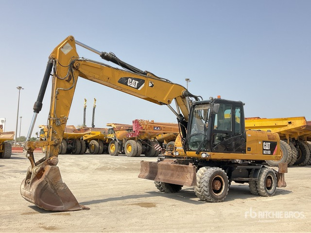 2012 Cat M318D - Багер на тркала: слика 2 2012 Cat M318D - Багер на тркала: слика 2