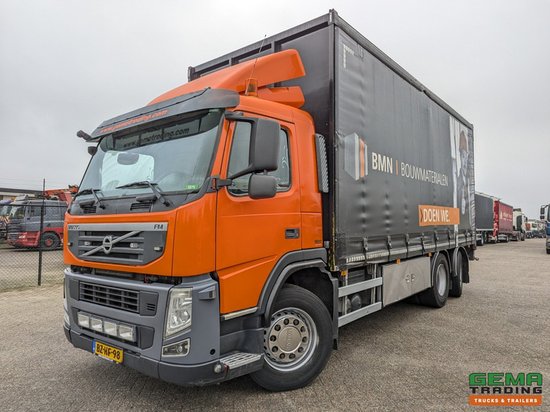 Volvo FM330 6x2/4 Daycab Euro5 EEV - SchuifzeilenBak 6.7m. - KooiAap Aansluiting - HH Vloer - Rongen - Камион со церада: слика 1 Volvo FM330 6x2/4 Daycab Euro5 EEV - SchuifzeilenBak 6.7m. - KooiAap Aansluiting - HH Vloer - Rongen - Камион со церада: слика 1