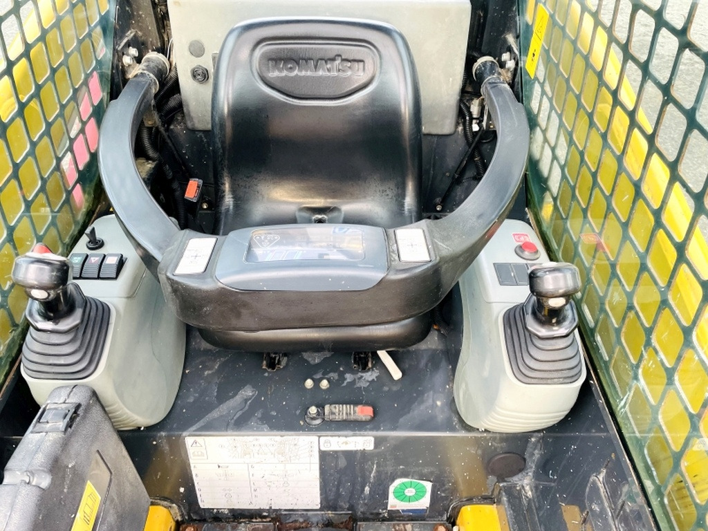 Komatsu SK714 (3906) - Компактен натоварувач: слика 5 Komatsu SK714 (3906) - Компактен натоварувач: слика 5