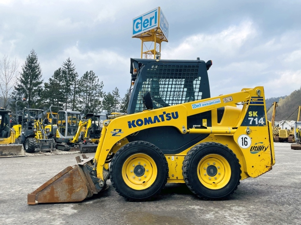 Komatsu SK714-5 (3947) - Компактен натоварувач: слика 1 Komatsu SK714-5 (3947) - Компактен натоварувач: слика 1