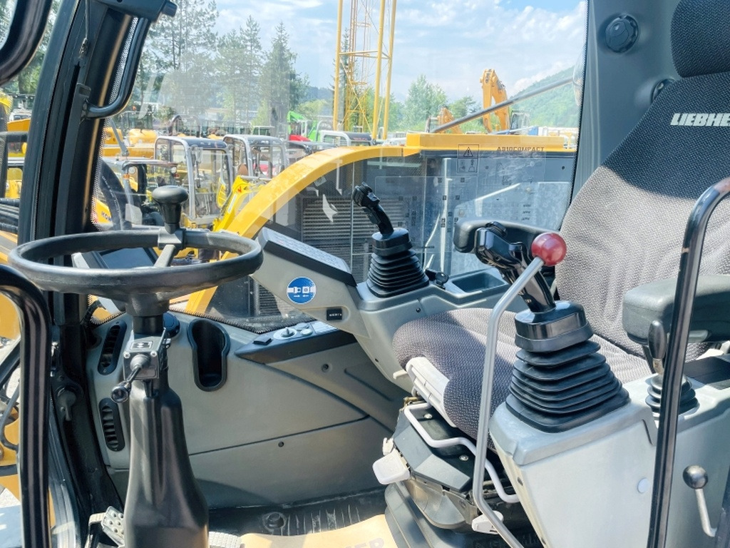 Liebherr A910 Compact (4025) - Багер на тркала: слика 5 Liebherr A910 Compact (4025) - Багер на тркала: слика 5
