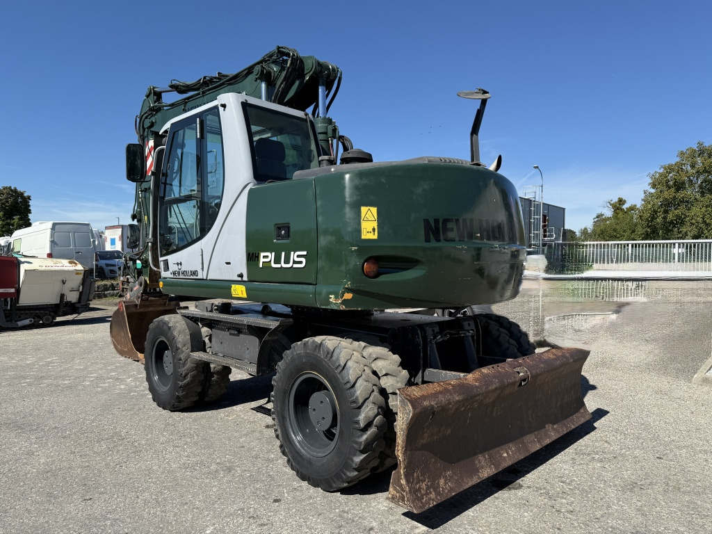 New Holland MH-Plus (111695) - Багер на тркала: слика 4 New Holland MH-Plus (111695) - Багер на тркала: слика 4
