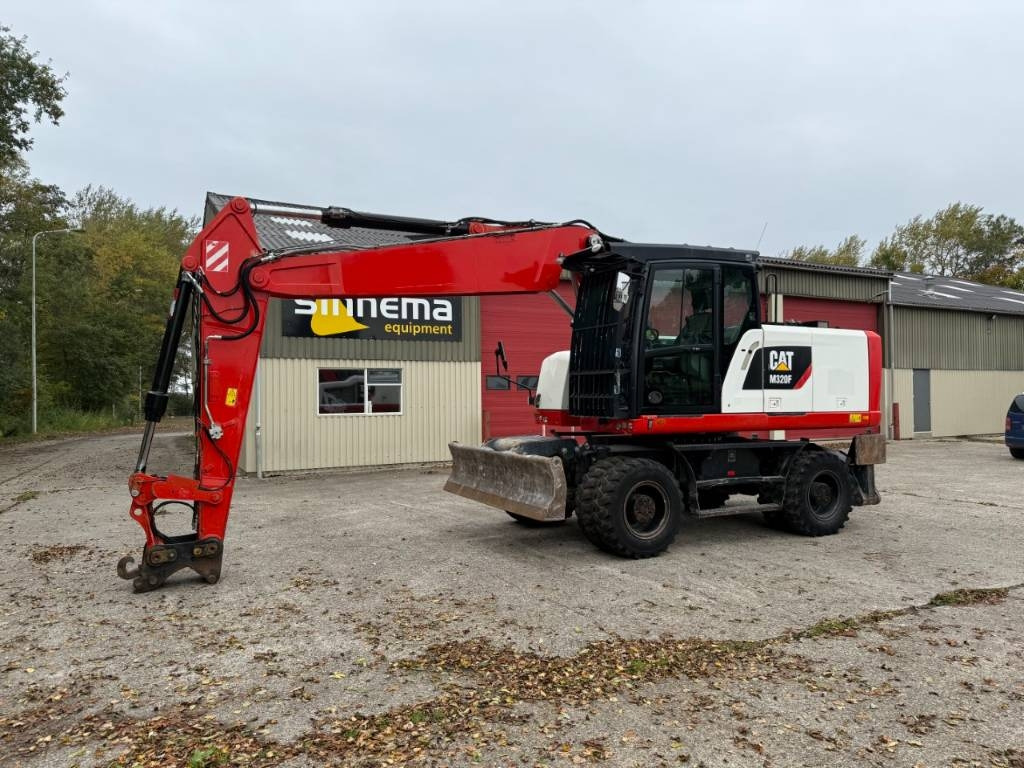 CAT M320F - Багер на тркала: слика 1 CAT M320F - Багер на тркала: слика 1