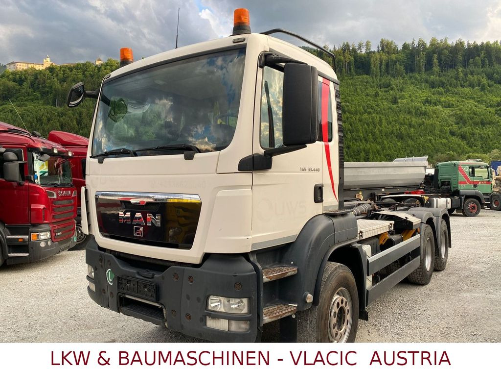 MAN TGS 33.440 (6x4) EEV Abrollkipper - Камион со кука за подигање: слика 1 MAN TGS 33.440 (6x4) EEV Abrollkipper - Камион со кука за подигање: слика 1