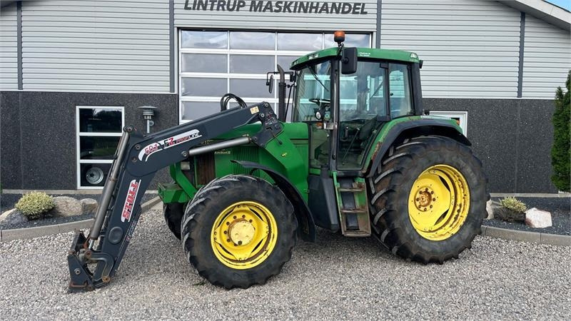 John Deere 6910 Auto Quad II-TLS Med frontlæsser - Трактор: слика 1 John Deere 6910 Auto Quad II-TLS Med frontlæsser - Трактор: слика 1