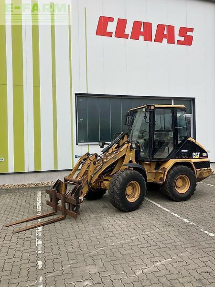 Caterpillar 906 - Мини багер: слика 1 Caterpillar 906 - Мини багер: слика 1