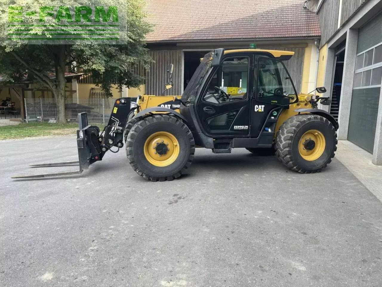 Caterpillar th408d - Телескопски ракувач: слика 1 Caterpillar th408d - Телескопски ракувач: слика 1