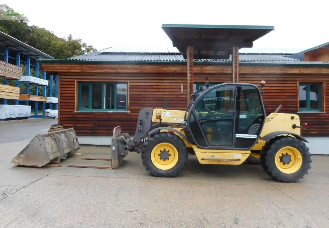 New Holland lm732 mit schaufel und gabel - Телескопски ракувач: слика 1 New Holland lm732 mit schaufel und gabel - Телескопски ракувач: слика 1