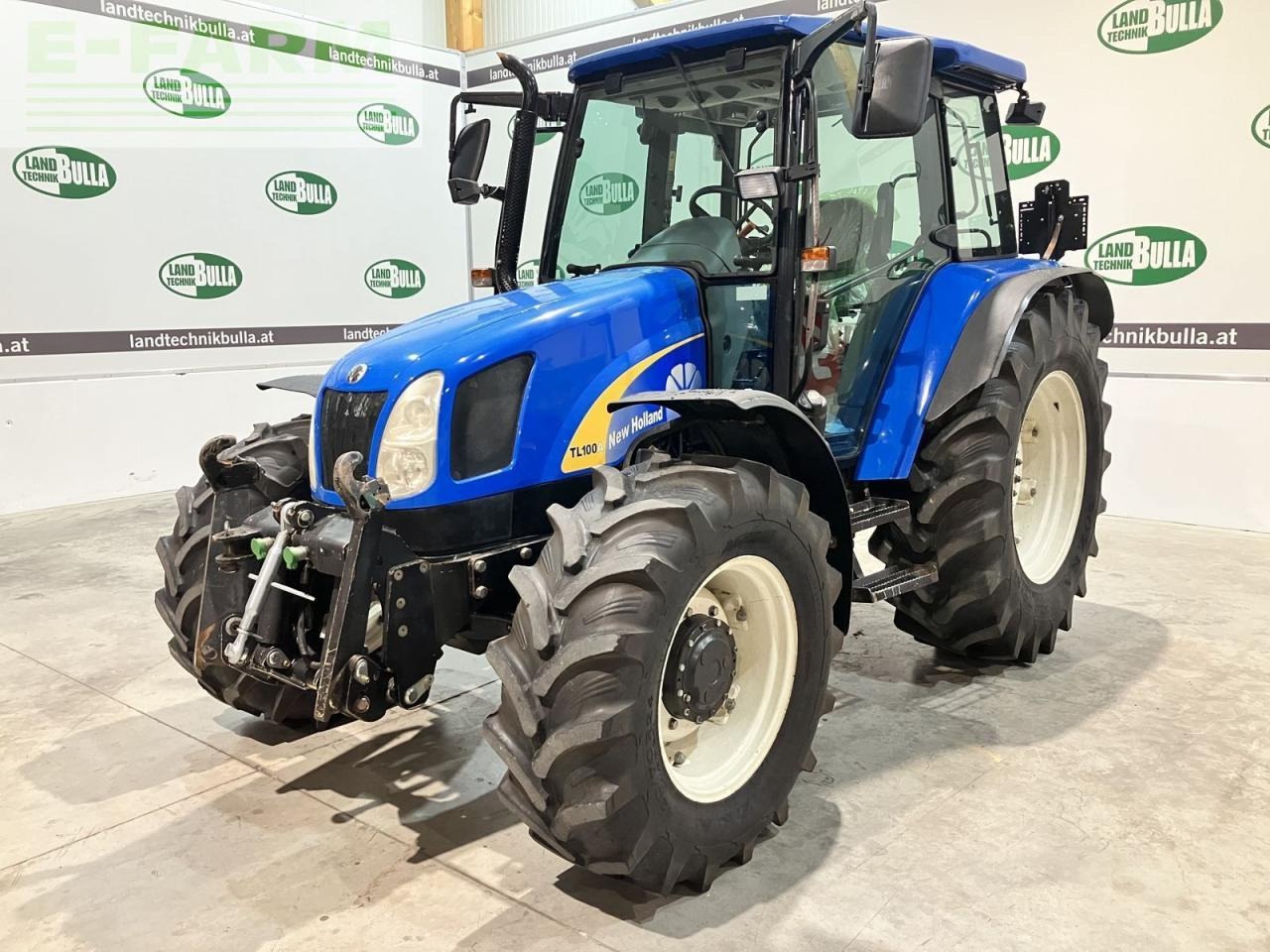 New Holland tl100a (4wd) A - Трактор: слика 1 New Holland tl100a (4wd) A - Трактор: слика 1