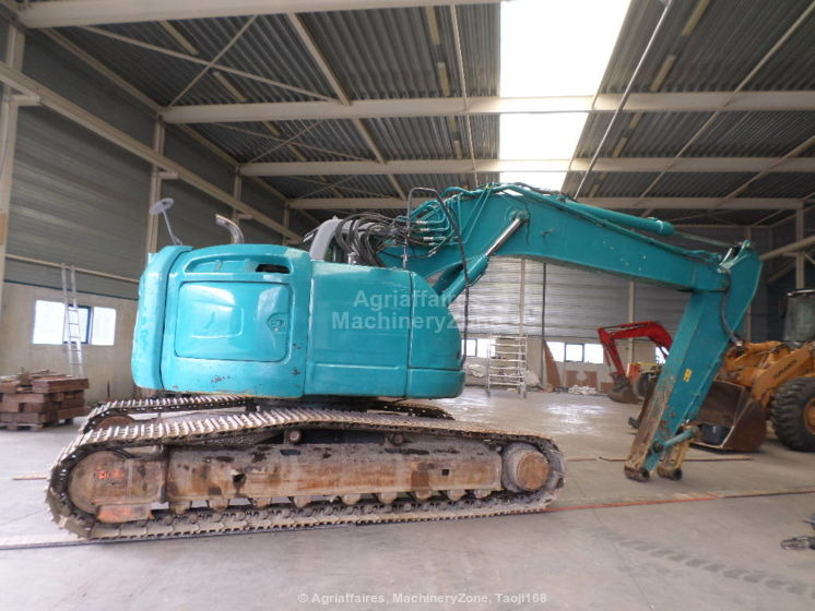 New Holland Kobelco Kobelco E 235 BSR-2 E 235 BSR-2 - Багер гасеничар: слика 2 New Holland Kobelco Kobelco E 235 BSR-2 E 235 BSR-2 - Багер гасеничар: слика 2