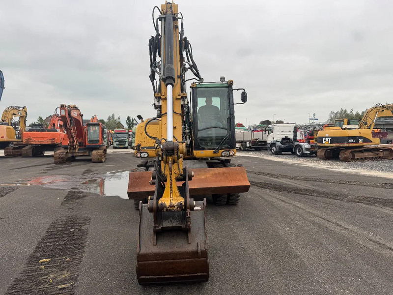 Caterpillar M313D 7212 HOURS - Багер на тркала: слика 2 Caterpillar M313D 7212 HOURS - Багер на тркала: слика 2